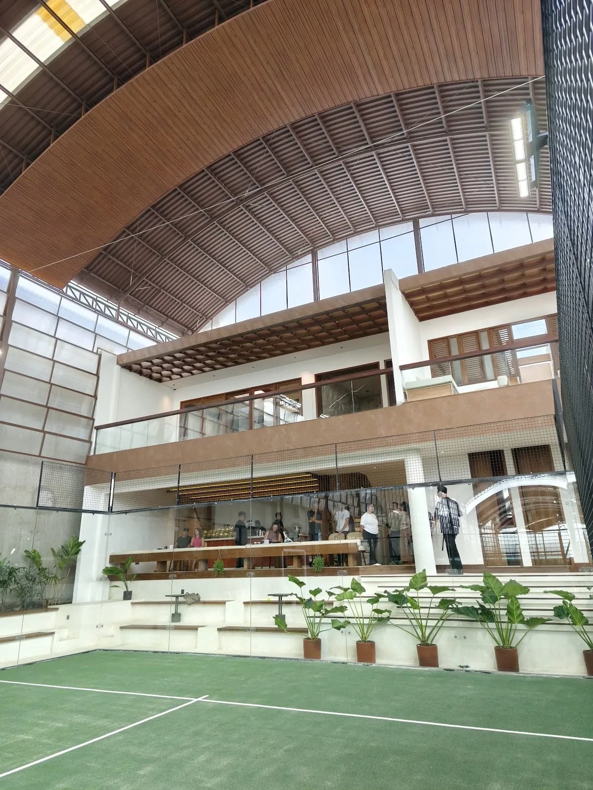Five indoor courts and the terrace at Pad Thai Padel Canggu